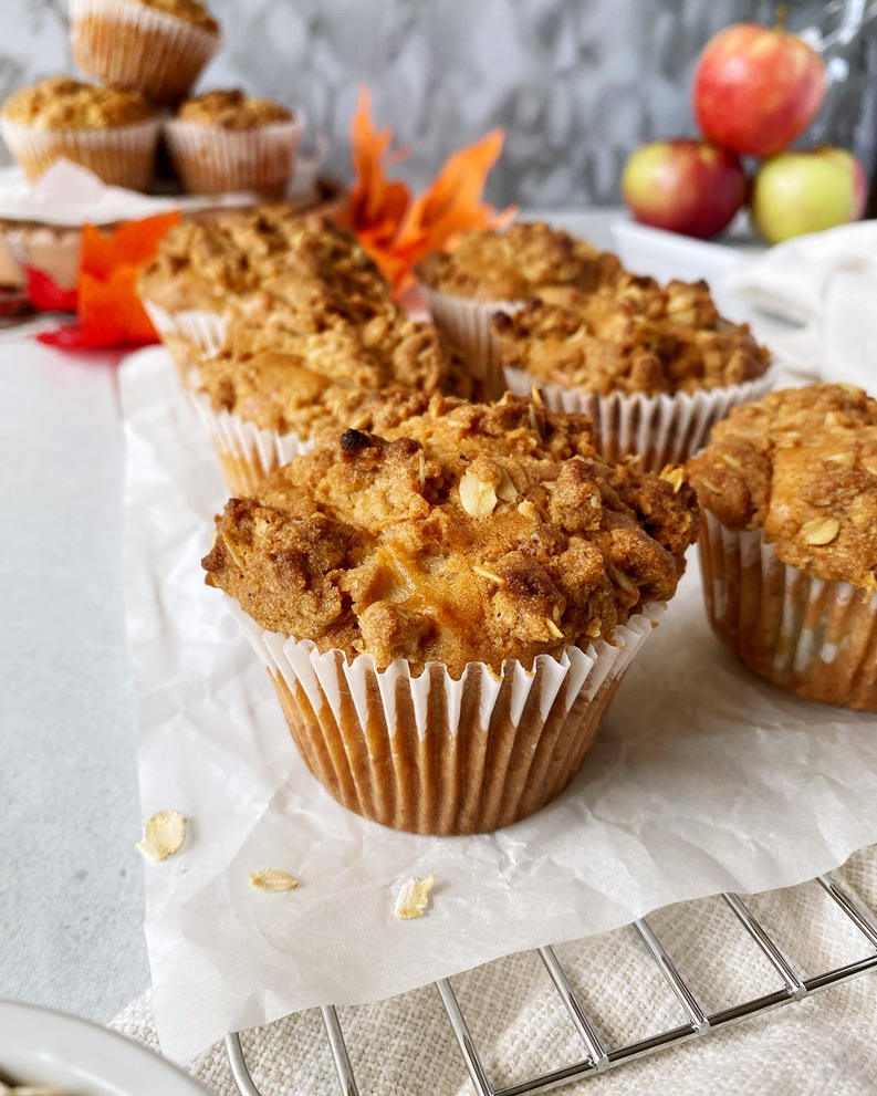 apple walnut muffin with streusel topping on wire rack