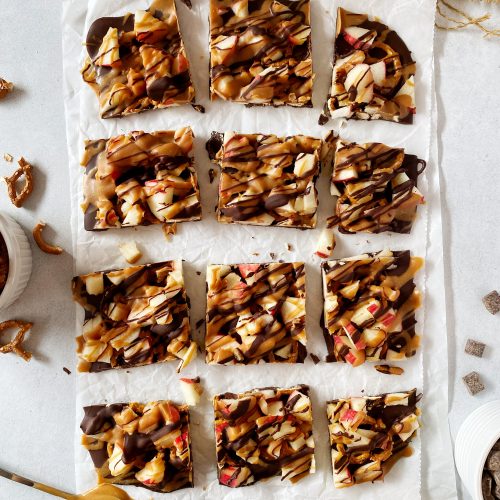 overhead photo of caramel apple bark on parchment paper