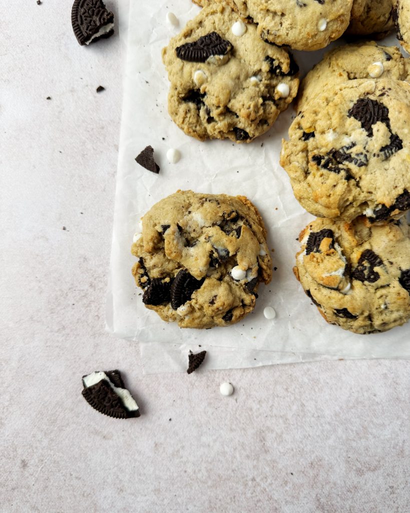 close up of cookies n cream cookie on white parchment paper