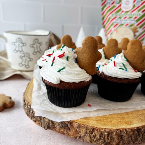 gingerbread muffins with frosting and mini gingerbread stuffed into frosting