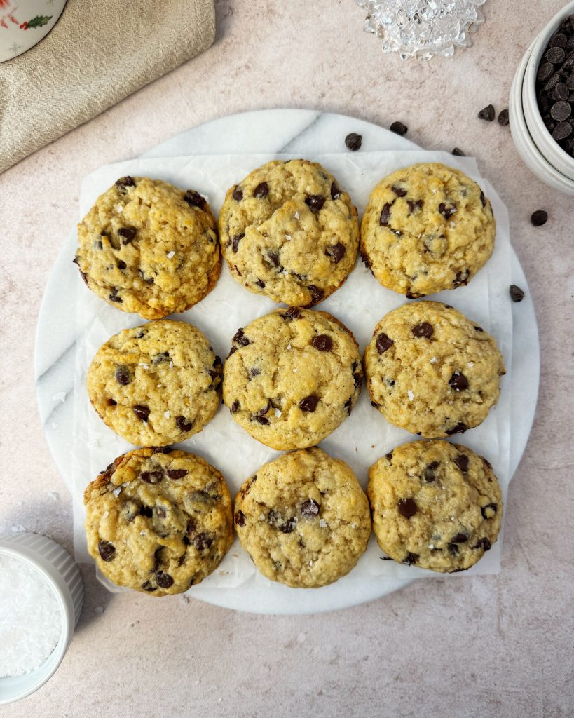 'nutella' stuffed chocolate chip cookies on a round marble board