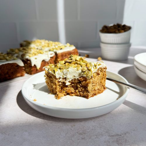 easy vegan pistachio cake with bite taken out of it