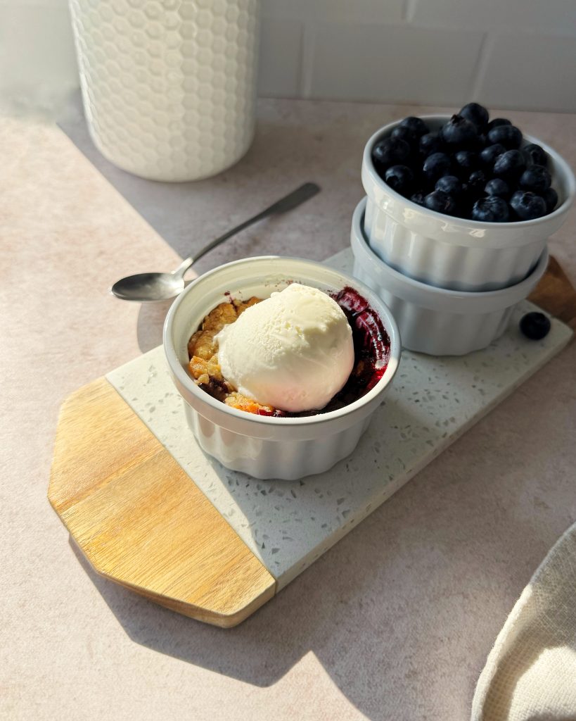 vegan single serve blueberry crumble topped with ice cream
