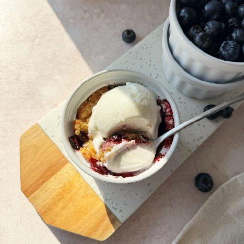 single serve blueberry crumble topped with ice cream