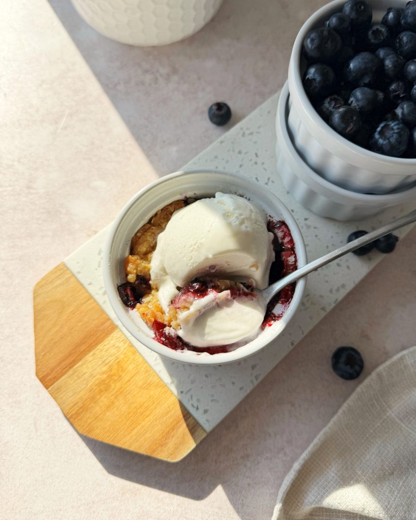 single serve blueberry crumble topped with ice cream
