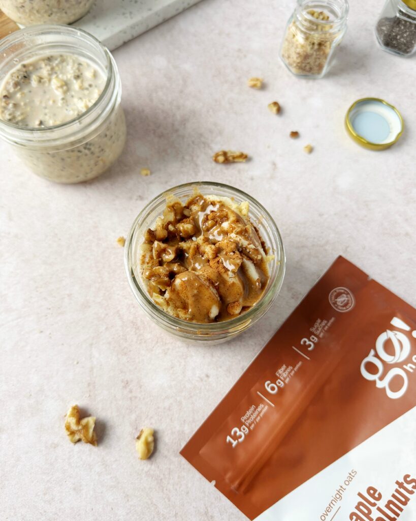 overnight oats topped with banana slices, walnut and hazelnut butter