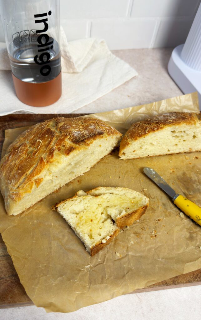 slice of sparkling water bread with butter spread on top 