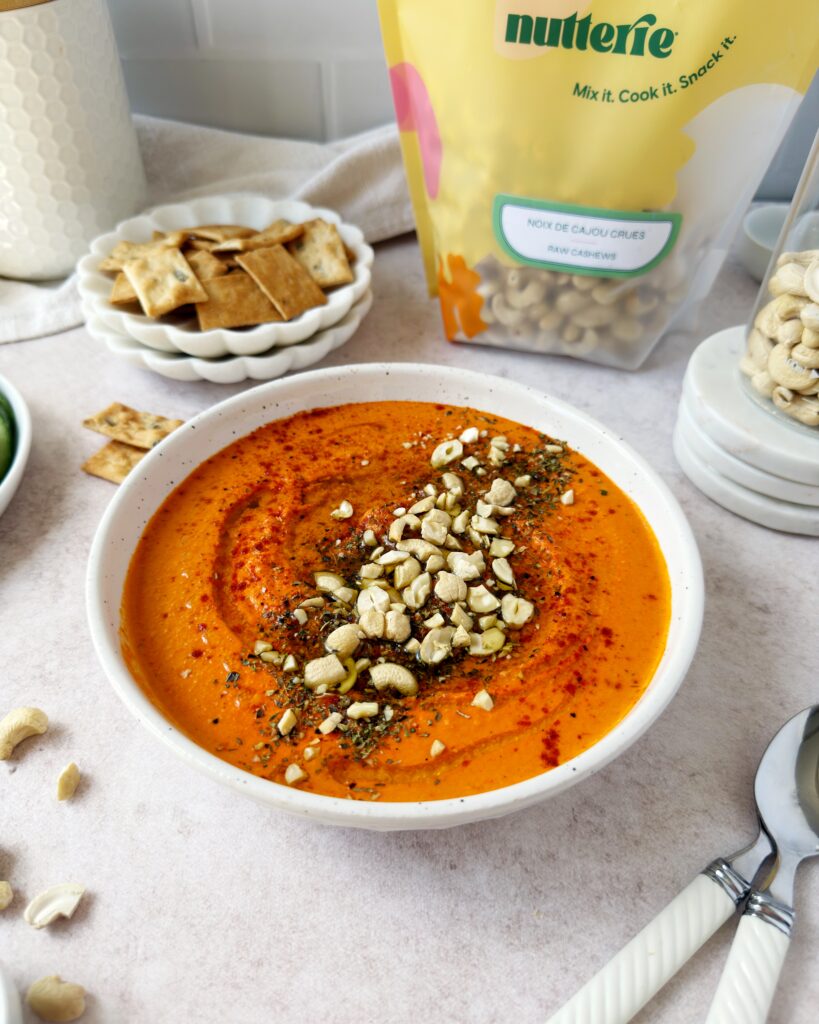 roasted red pepper and cashew dip in round bowl